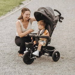 Kinderkraft Tricycle with mom and child enjoying a park outing