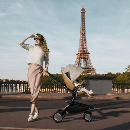 Woman with Mima Creo Stroller Mocha walking near Eiffel Tower