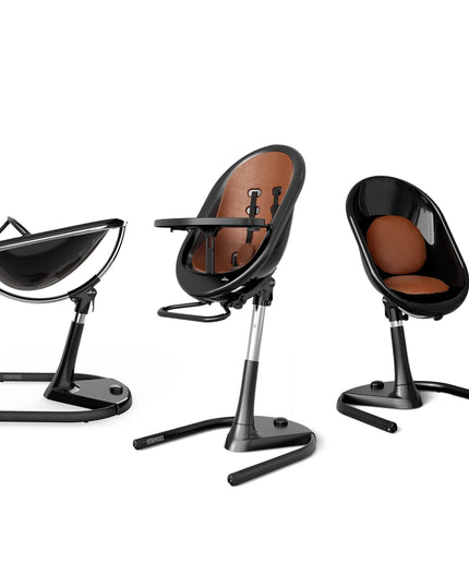 Mima Moon High Chair in Black and Camel, featuring three configurations: reclined, upright, and toddler seat.