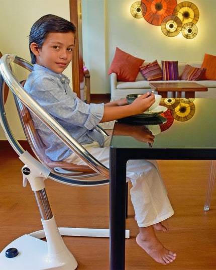 Boy dining in Mima Moon High Chair