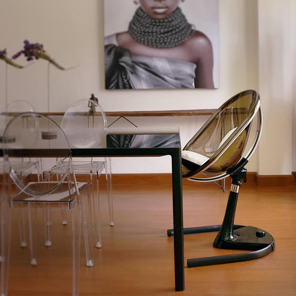 Mima Moon High Chair in a modern dining room with artistic decor.