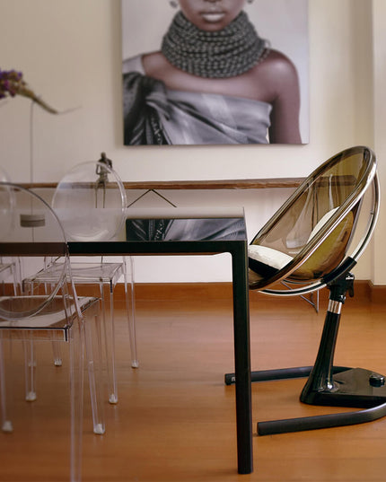 Mima Moon High Chair in a modern dining room with artistic decor.