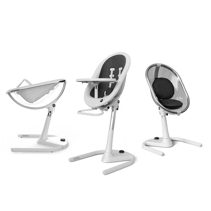 Mima Moon High Chair in White and Black, highlighting three configurations: reclined, upright, and toddler seat.