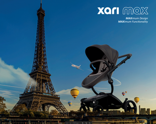 Mima Xari MAX stroller in front of the Eiffel Tower with hot air balloons.