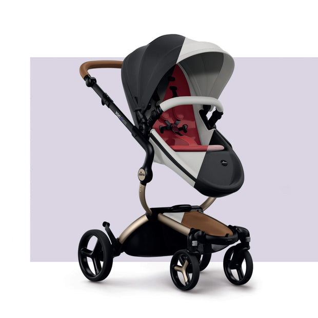 Mima XARI MAX stroller with red and gray seat on white background