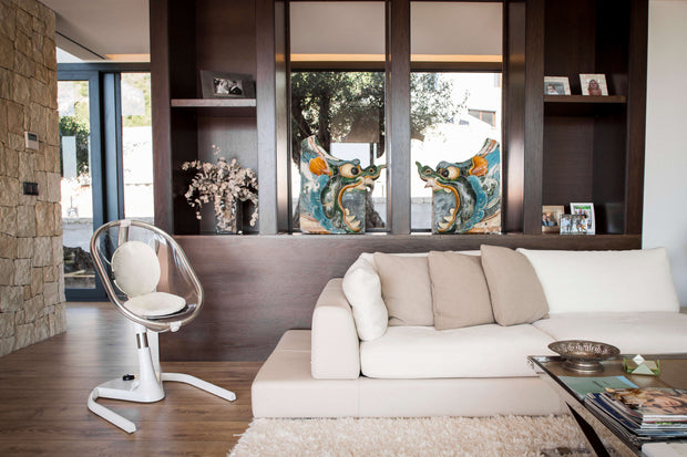 Modern living room with Mima Moon High Chair and contemporary decor.