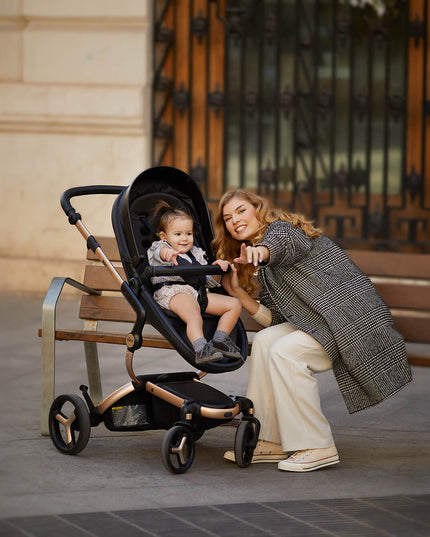 Mother and child enjoying a walk with Mima XARI MAX stroller