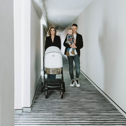 Parents with the Kunert Ivento Glam Stroller 
